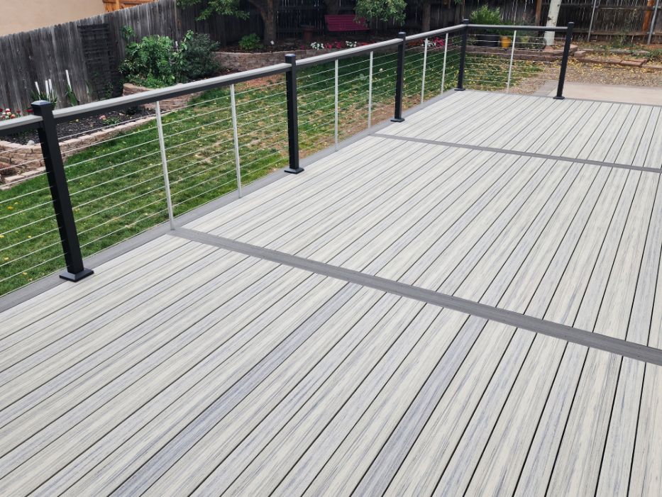 Grey Deck Featuring Black and Silver Railing